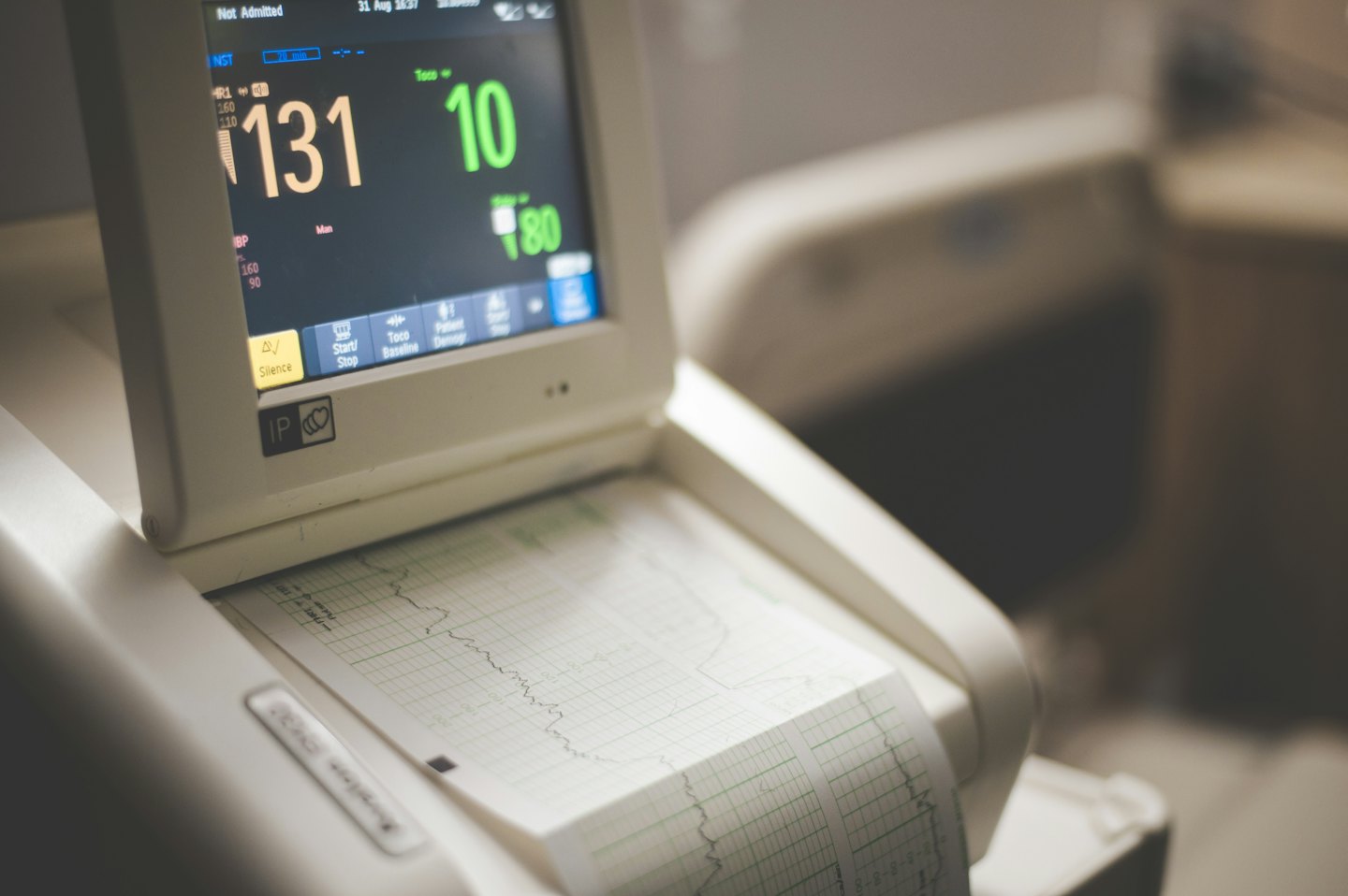 Medical monitoring device displays patient vital signs.